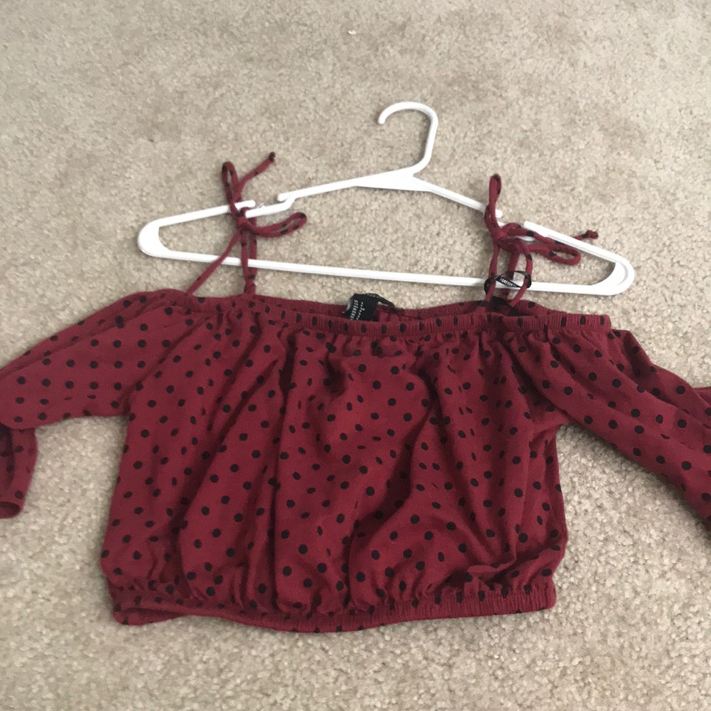 Off the shoulder shirt , which is crop